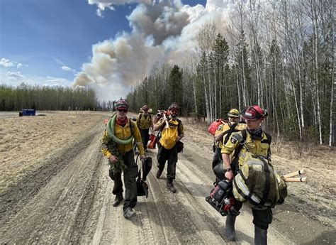 Premier says more than 24,000 forced from homes by Alberta wildfires